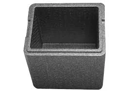 A gray, hollow, rectangular concrete block is shown from above, displaying its open interior and thick walls—constructed with Better Densifiers for enhanced durability.